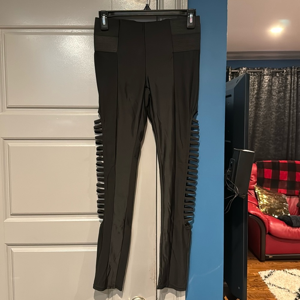 Black spandex pants with side cutouts
